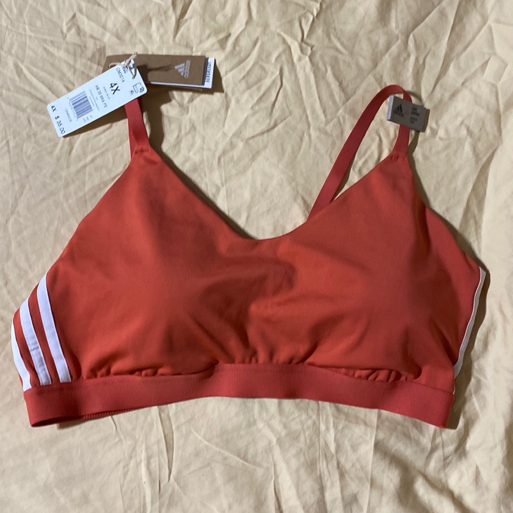 Adidas sports bra, size 4X, coral orangey color, with white stripes, nwt
